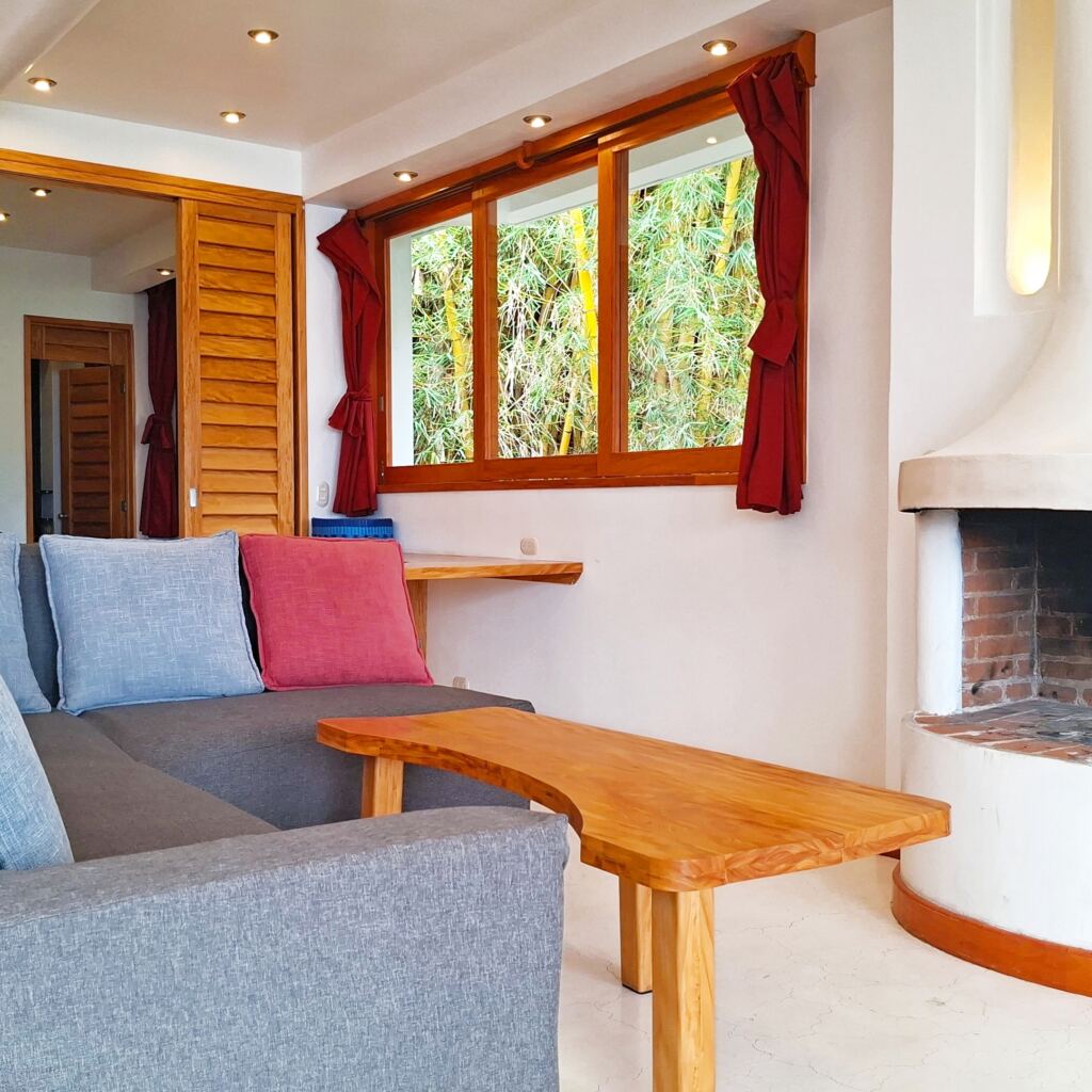 The comforting warmth of the fireplace as the evening sets in.