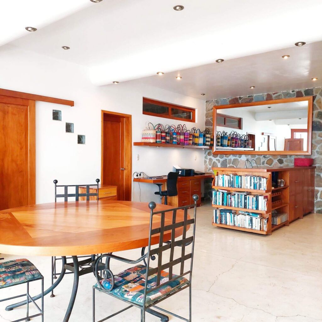 Books within reach. A desk when inspiration strikes. A table for gathering.